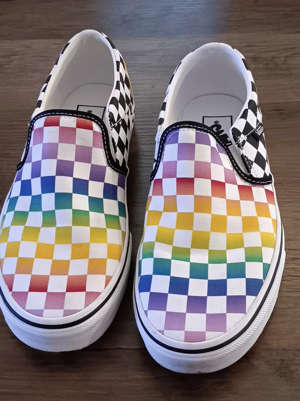 Vans Rainbow Checkerboard Slip-On Sneakers